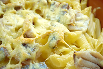 Baked pasta penne with mackerel