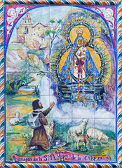 Obraz na płótnie Canvas Seville - The ceramic tiled Madonna on the church facade