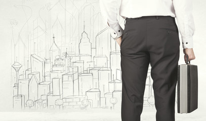 Businessman with drawn city view