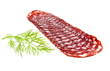 Slices of sausage with fennel isolated on a white background