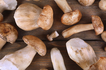 Wild mushrooms on wooden table