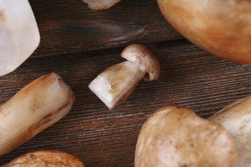Wild mushrooms on wooden table