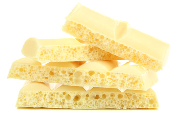 Tasty porous chocolate, isolated on white