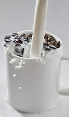 Milk in coffee.