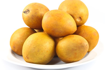 fresh Sapodilla fruits on white background