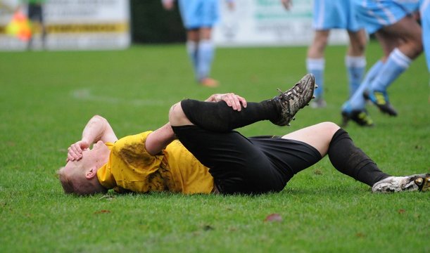 Fototapeta blessure au football