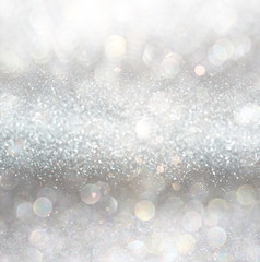 silver and white bokeh lights defocused. abstract background