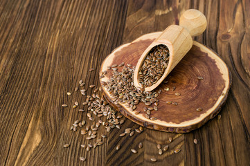 Flax seeds  in wooden scoop