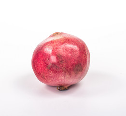 whole pomegranate isolated on white background