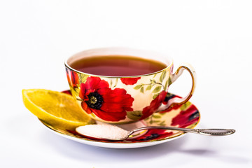 red mug of tea with lemon