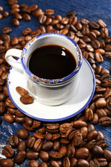 Cup of coffee on wooden table