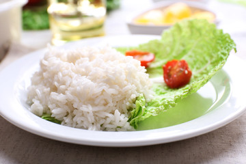 Boiled rice served on table, close-up