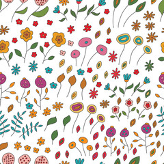Seamless pattern of flowers of different colors on white