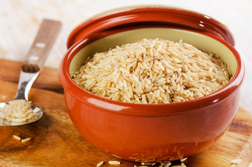 natural brown rice in a   bowl .