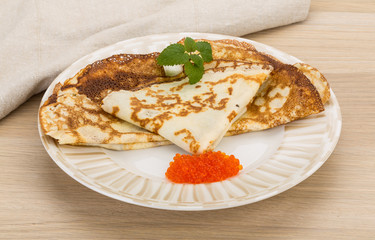 Pancakes with red caviar