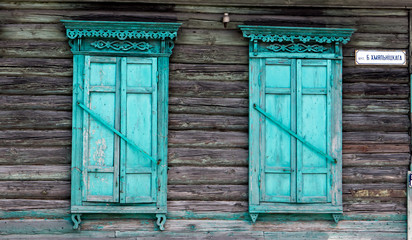 Fototapeta na wymiar Wooden window with shutter doors.