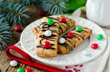 Obraz na płótnie Canvas Christmas shortbread cookies with chocolate dragees