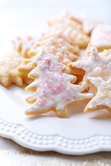 Iced Christmas cookies with sugar pearls