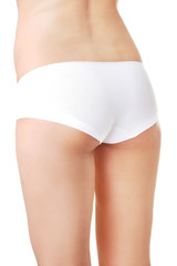 Close up on slim woman buttocks in underwear