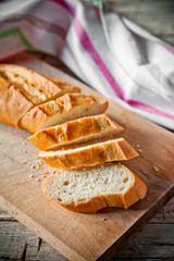 french bread baguette and linen napkin