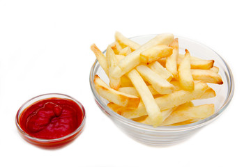 Bowl of chips and ketchup on white background