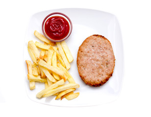 Hamburger with fries and ketchup from above