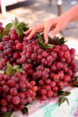Red grape sale in local market.
