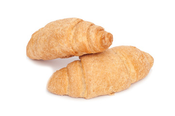 Fresh and tasty croissants isolated on white background