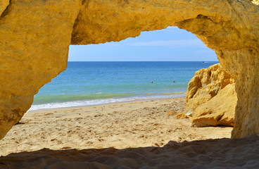 Natural stone arch on Armacao De Pera Beach