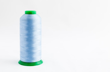 Spool of thread isolated on white background