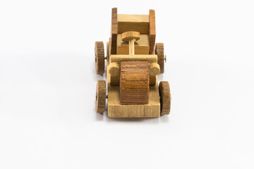 Wooden toy car miniature isolated on white background