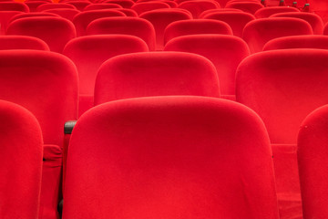 Obraz premium empty red cinema or theater seats