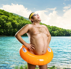 Strange naked man on the lake