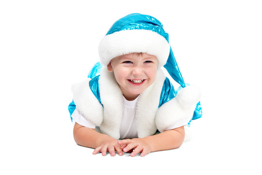 Santa Kid iying on floor and smiling