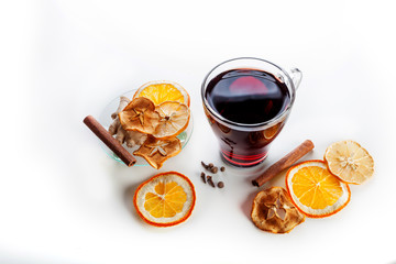 mulled wine with spices, ginger, cinnamon on a white background