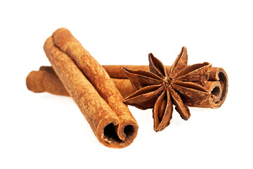 Cinnamon sticks and stars anise isolated on a white background