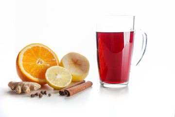 mulled wine with spices, ginger, cinnamon on a white background