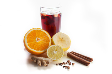 mulled wine with spices, ginger, cinnamon on a white background