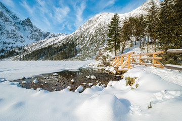 Morskie Oko lake in winter landscape of Tatra Mountains, Poland - obrazy, fototapety, plakaty