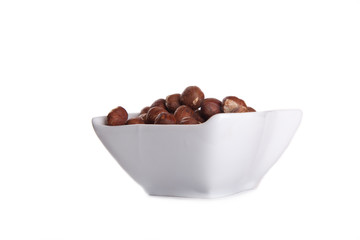 hazelnuts in white dish