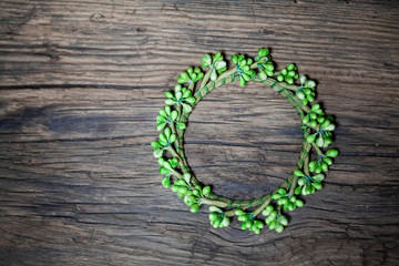 green wreath on old wood