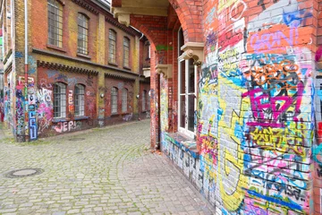 Poster Graffiti Graffiti-Backsteinmauerkunst in Deutschland