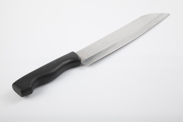 Stainless steel knife with black handle on white background