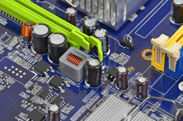 Printed computer motherboard with microcircuit, close up, DOF