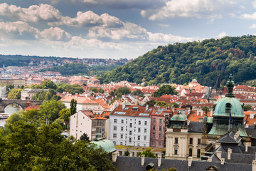 Fototapeta premium Bridge and rooftops of Prague
