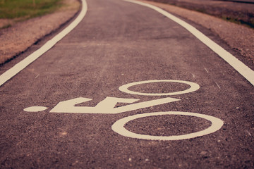Vintage bicycle sign on road, Bicycle path