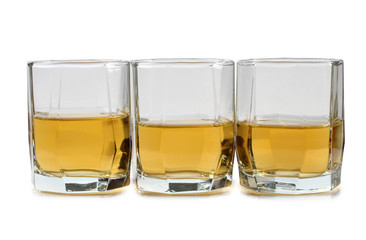Glasses whiskey on white
