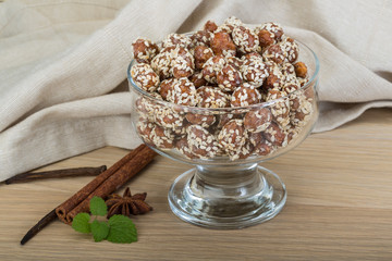 Peanut in honey with sesame seeds