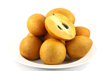 fresh Sapodilla fruits on white background