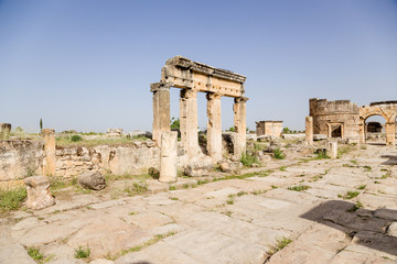 Fototapeta na wymiar Hierapolis. The ruins of the colonnade and Domitian Gate